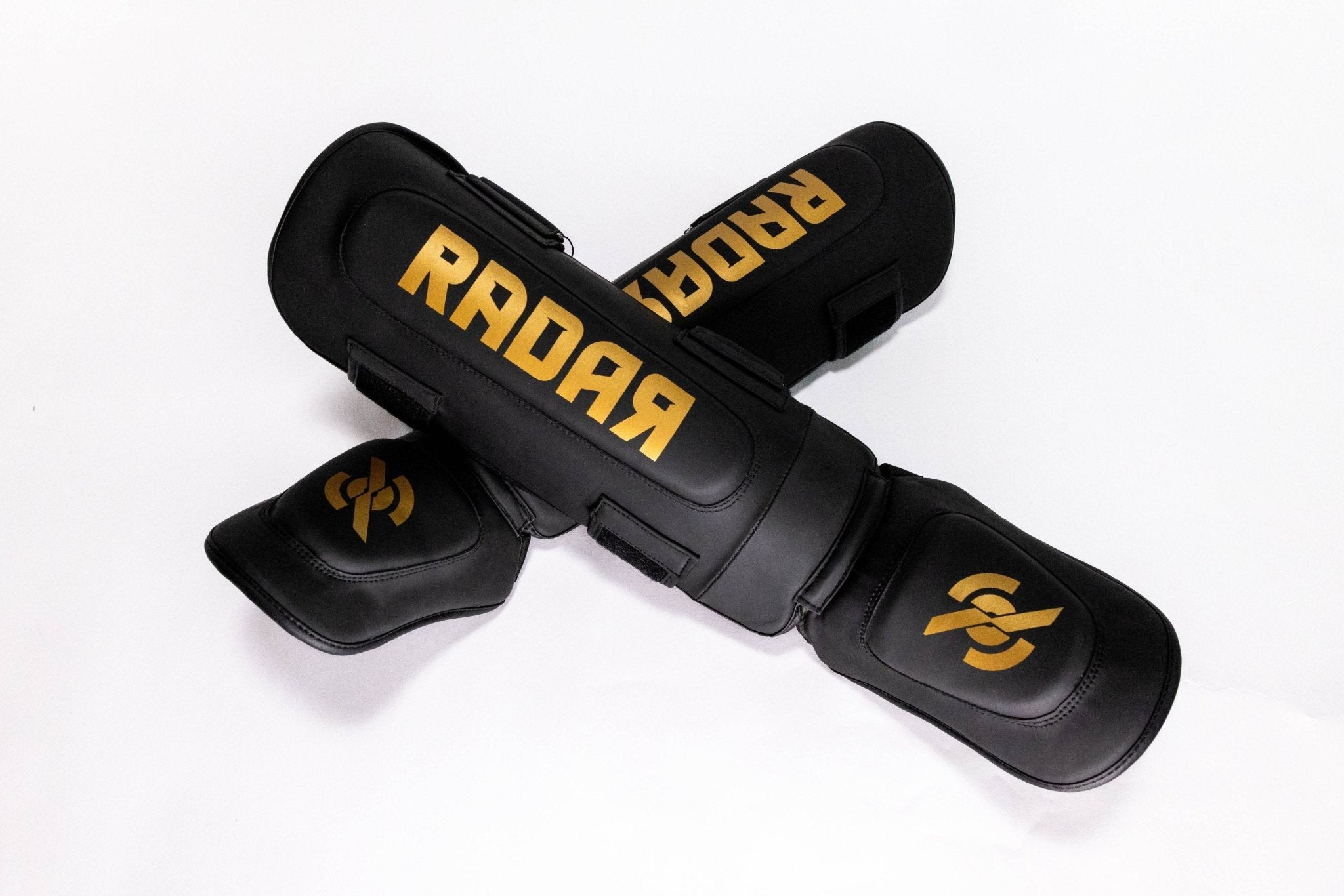 Scheenbeschermers Kids Zwart/Goud - Radar Gear – Premium sportkleding & accessoires voor topprestaties